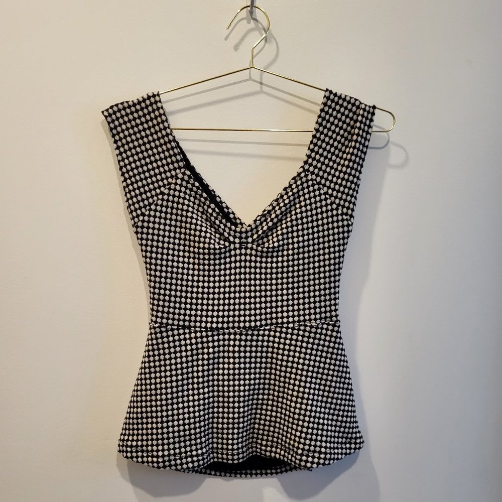 Anthropologie Black and white cutout top